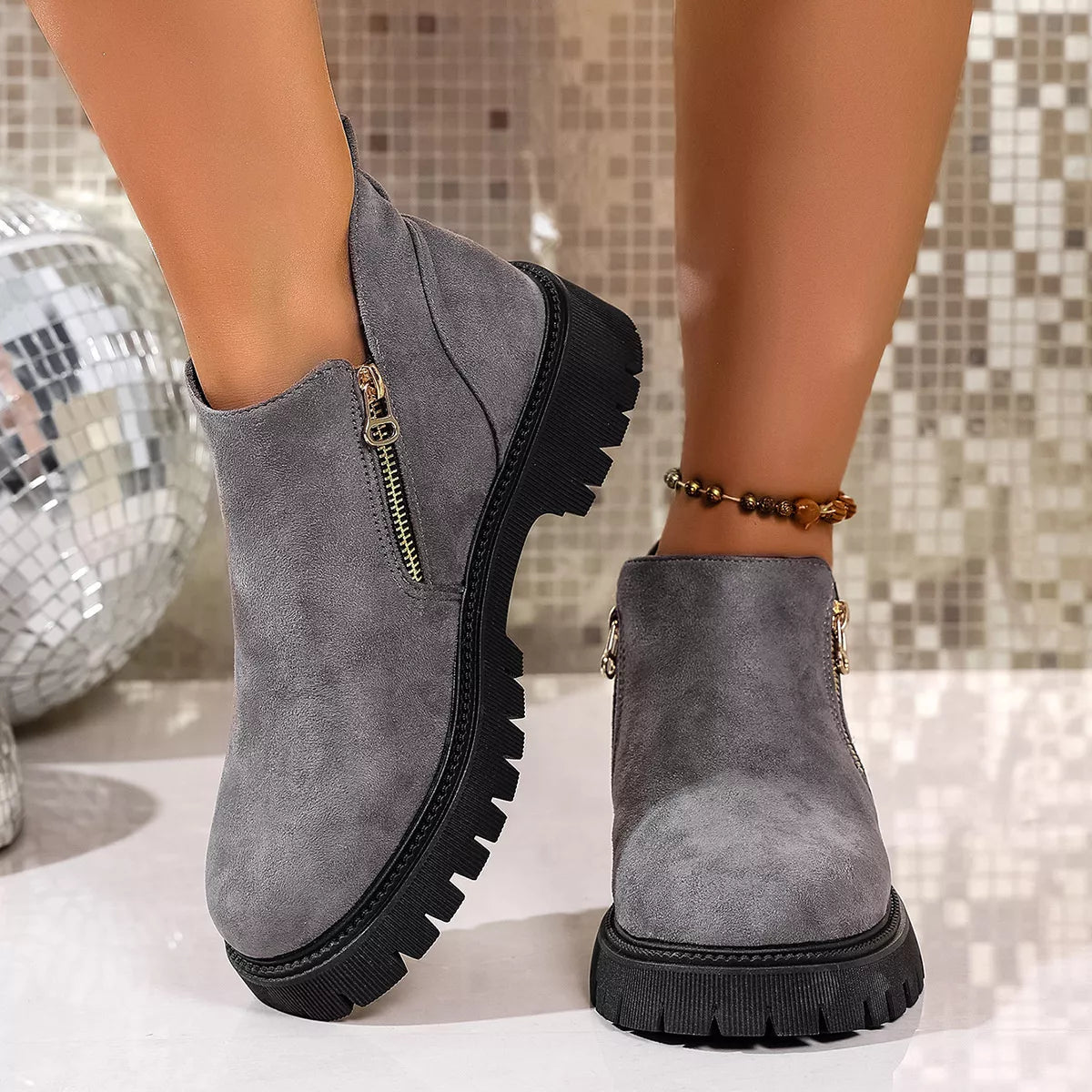 Round toe side zip ankle boots toe close up