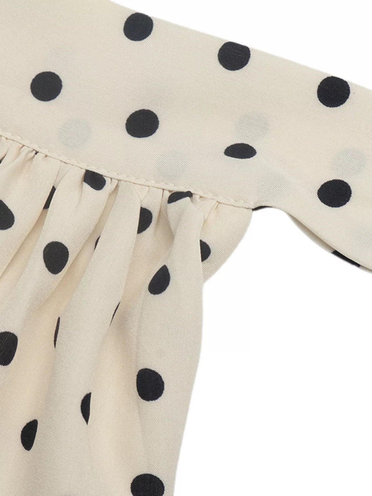 Polka dot mini dress detail of tie back