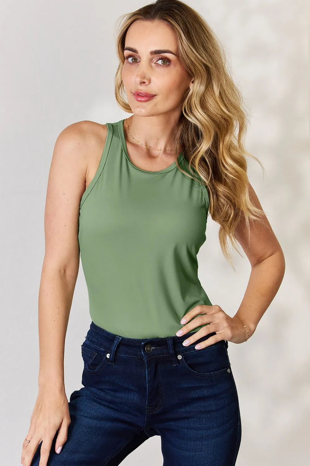 Fitted racerback tank top in white side view