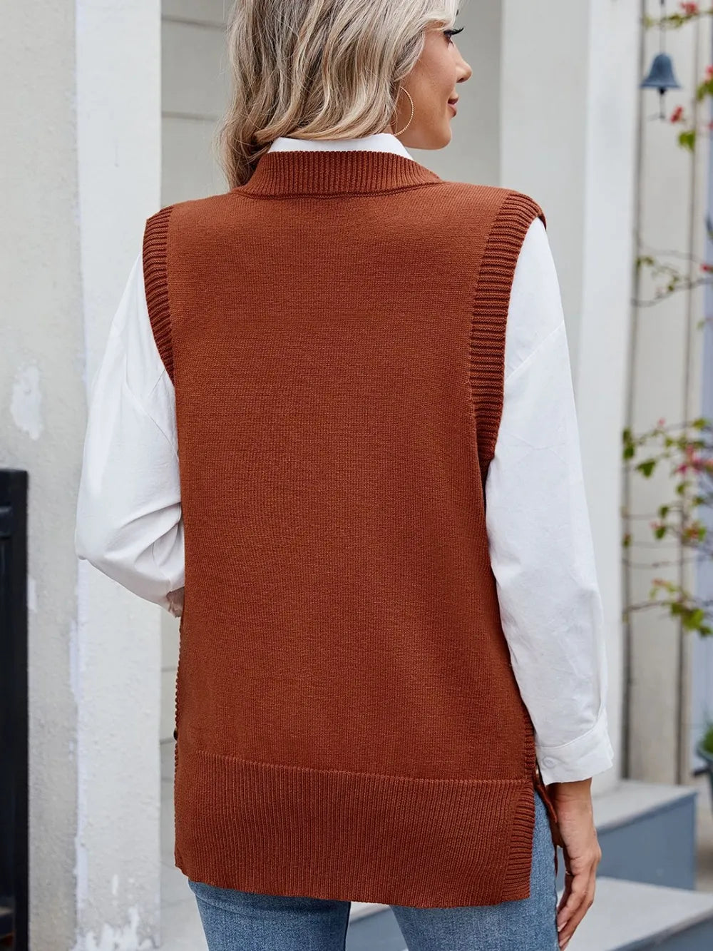 buttoned round neck sweater vest close up detail