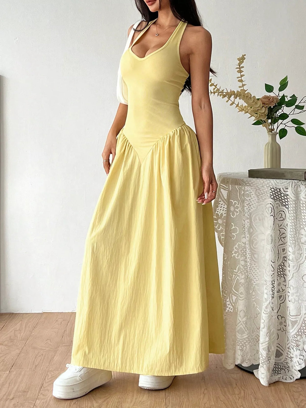 Full length view of the womens yellow maxi dress