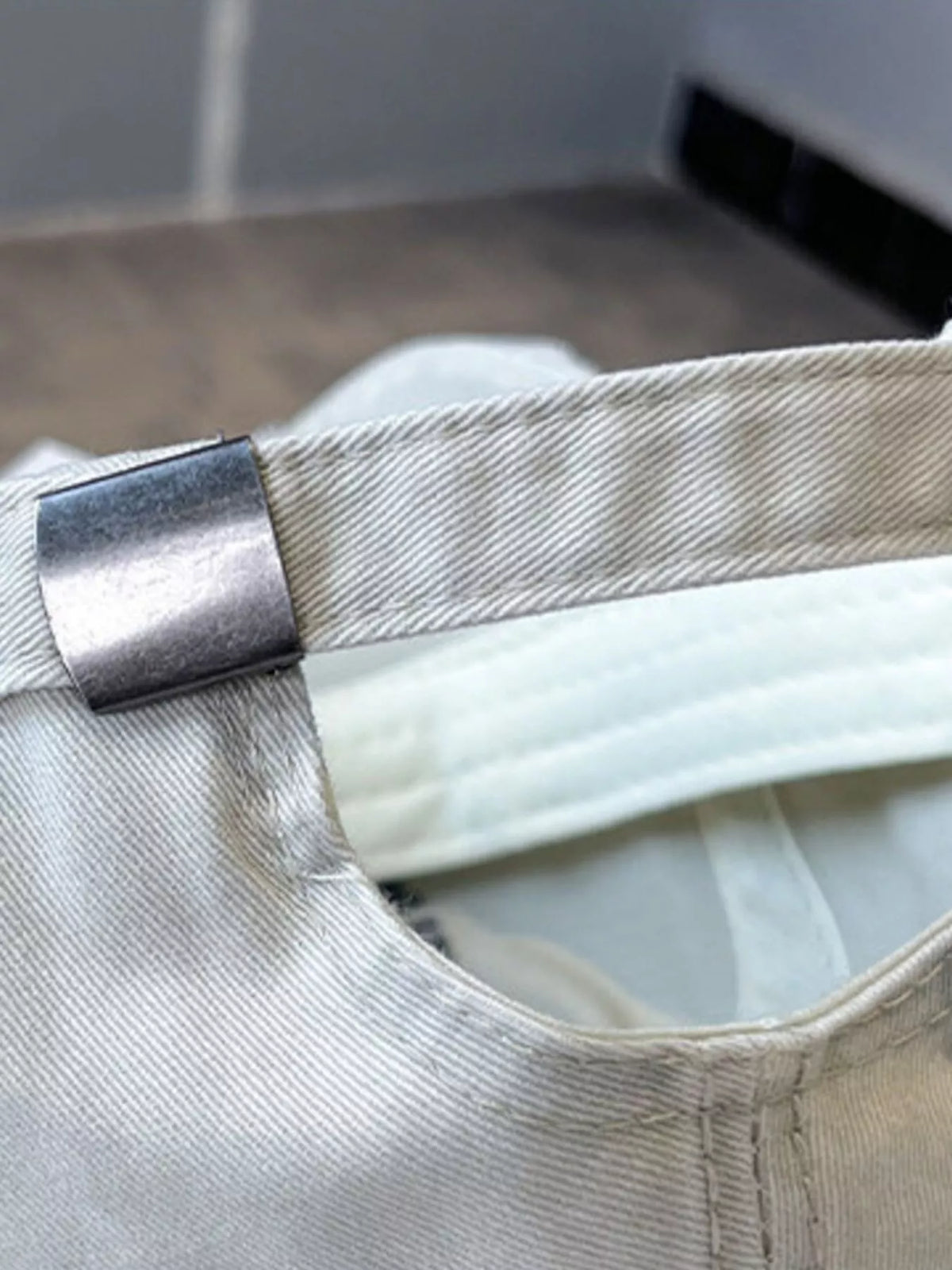 Cotton baseball cap shown in a light neutral colourway