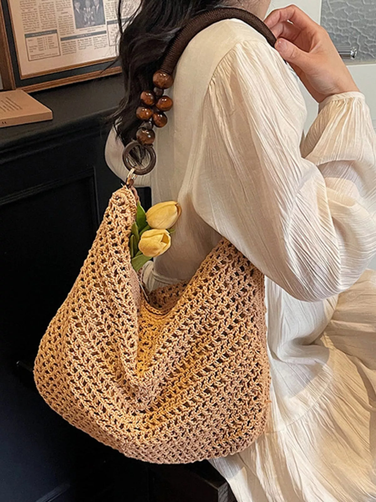 Knitted bead handle shoulder bag overhead view
