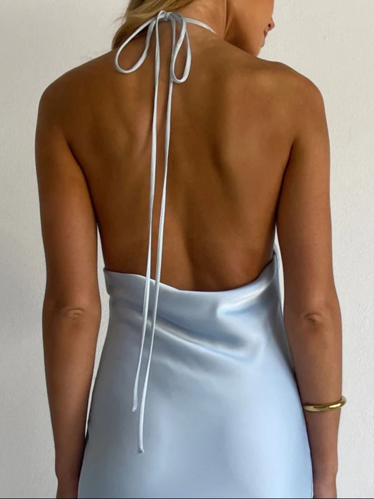 Halter neck satin dress detail close up