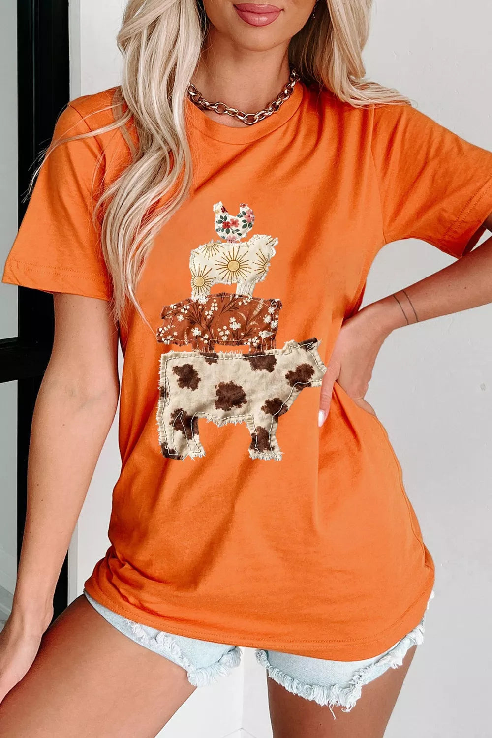 Animal design short sleeve tee in sherbet, front view