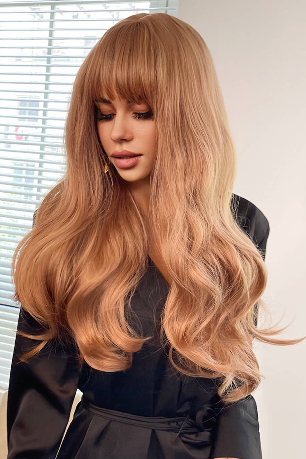 Wig styled over shoulder