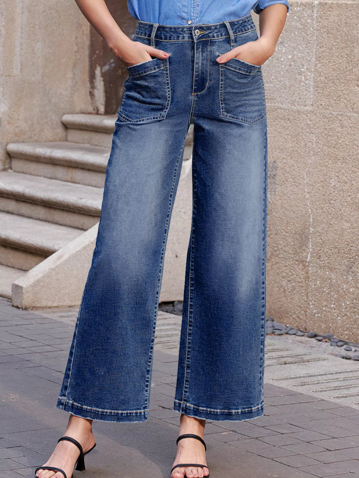 Medium wash shift jeans patch pocket detail