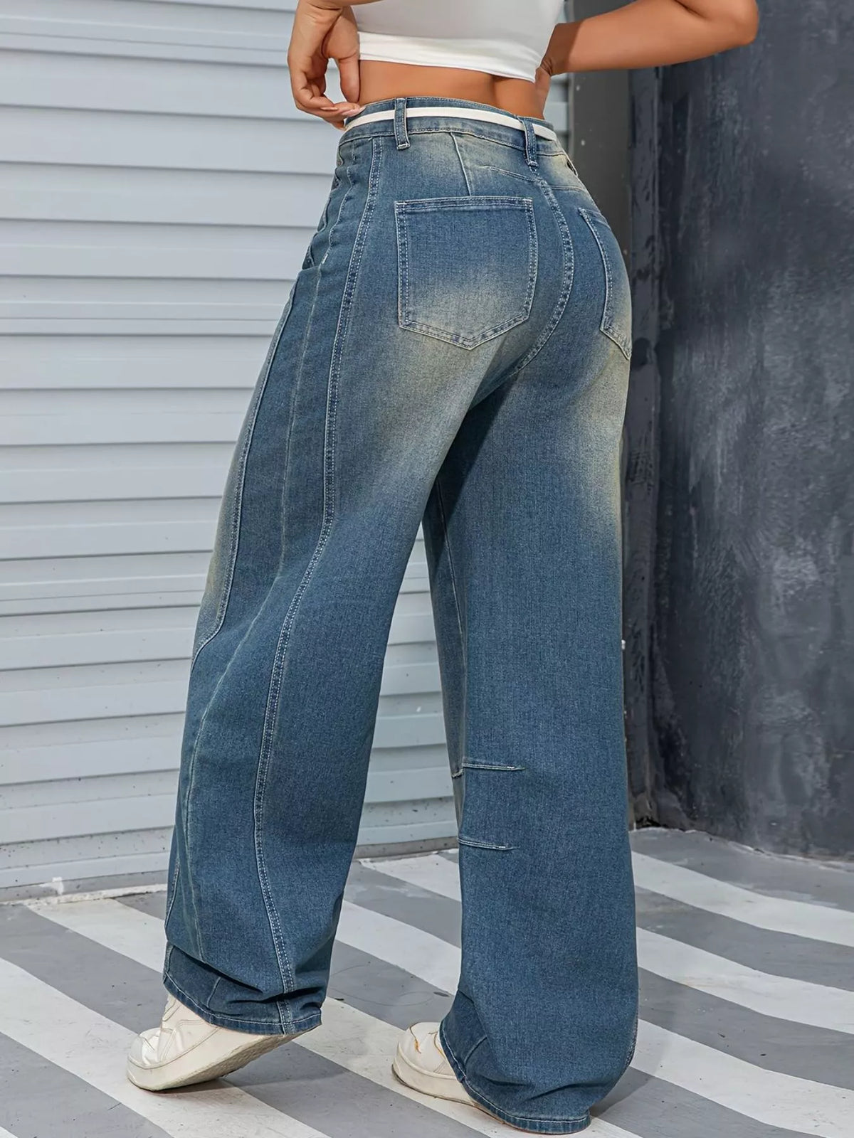Back view of vintage wash wide leg jeans