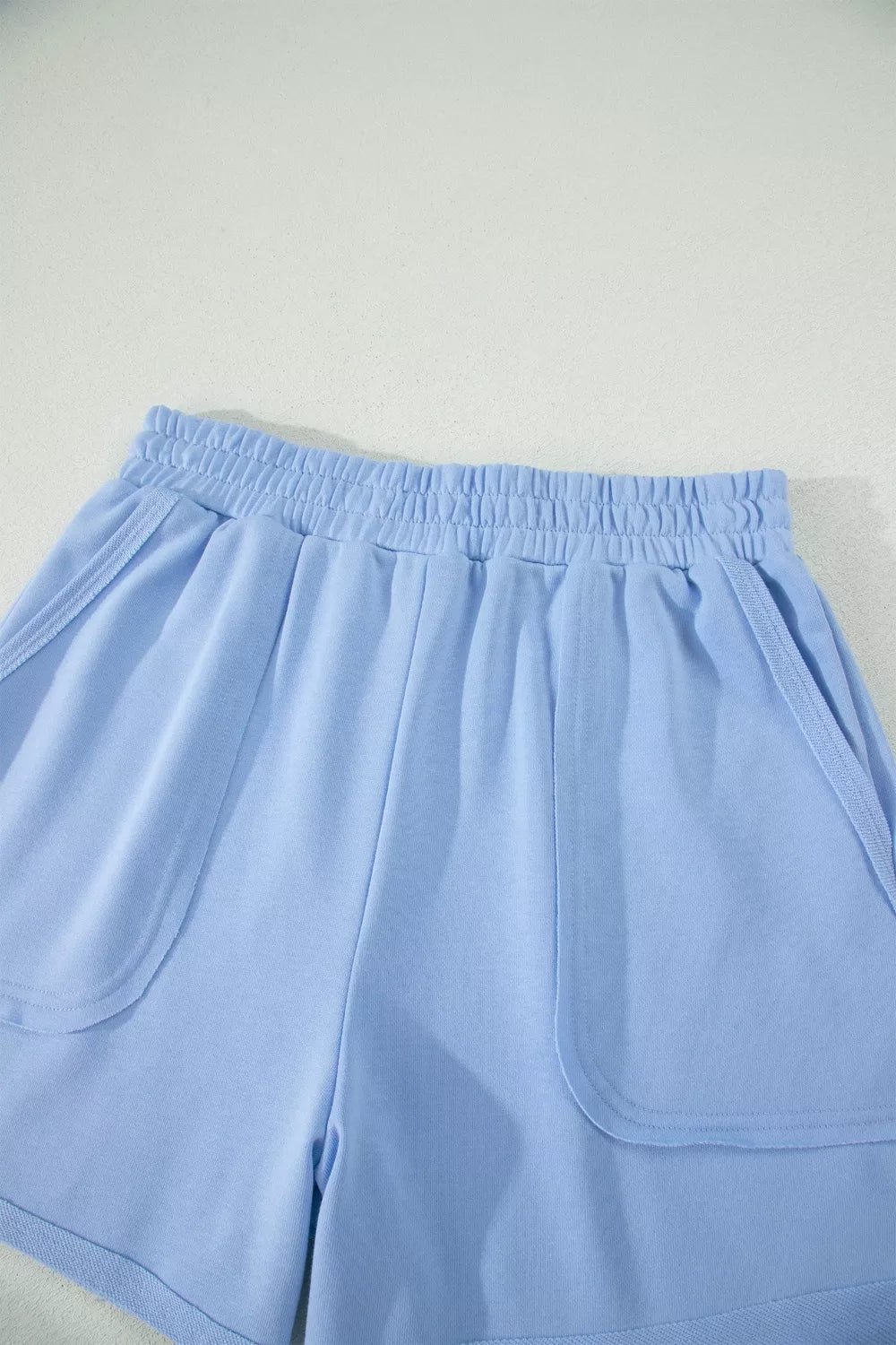 Coordinated polo sleeveless top and shorts set look