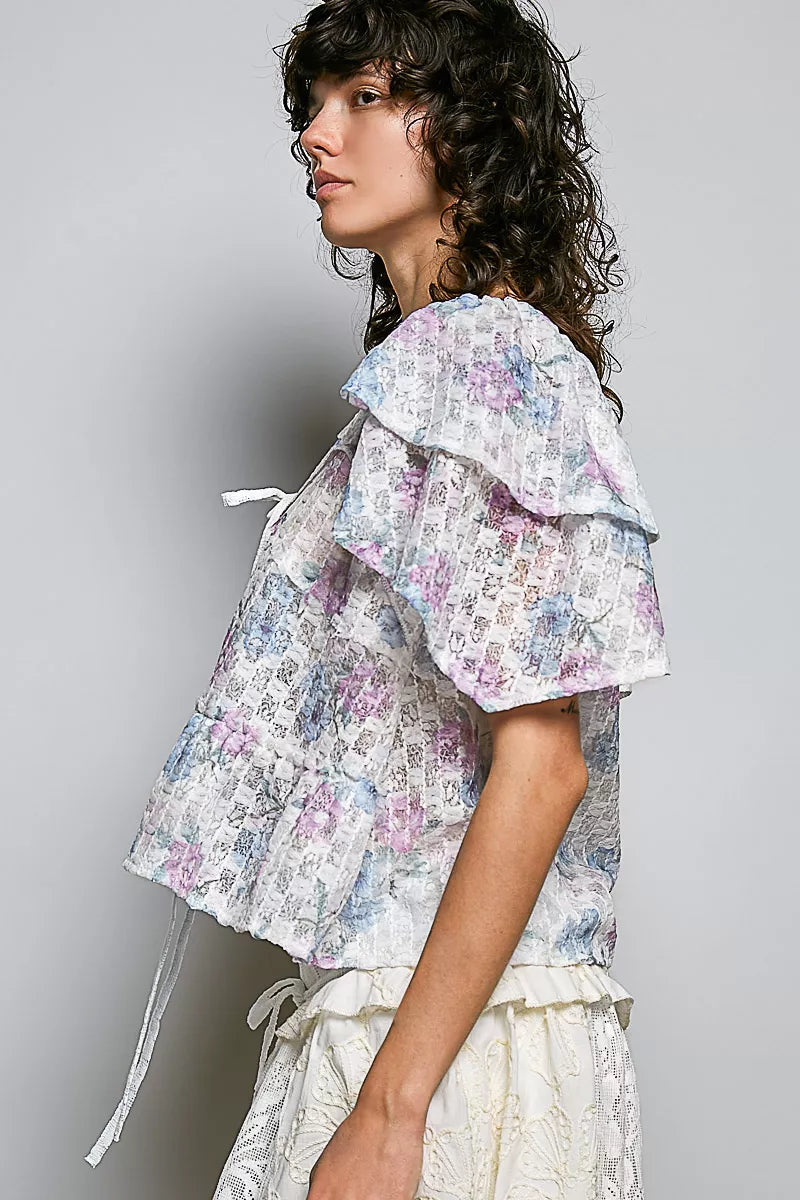 Sheer lace blouse with allover floral pattern, close detail