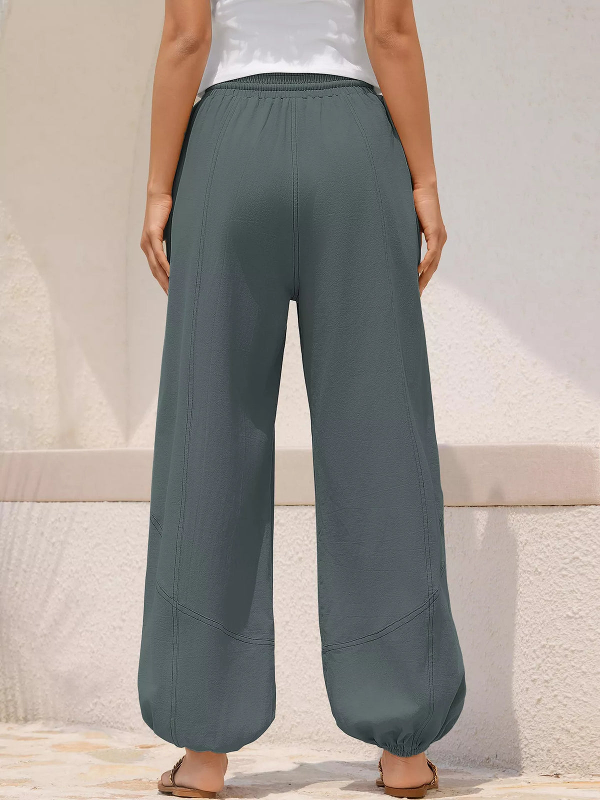 Loose fit drawstring waist harem joggers side view