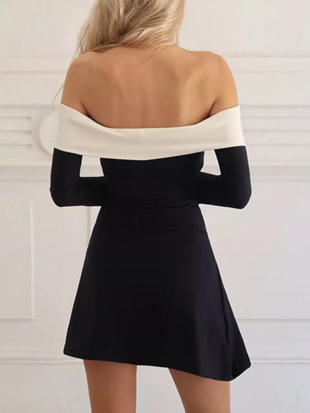 off shoulder bell sleeve mini dress in black side view