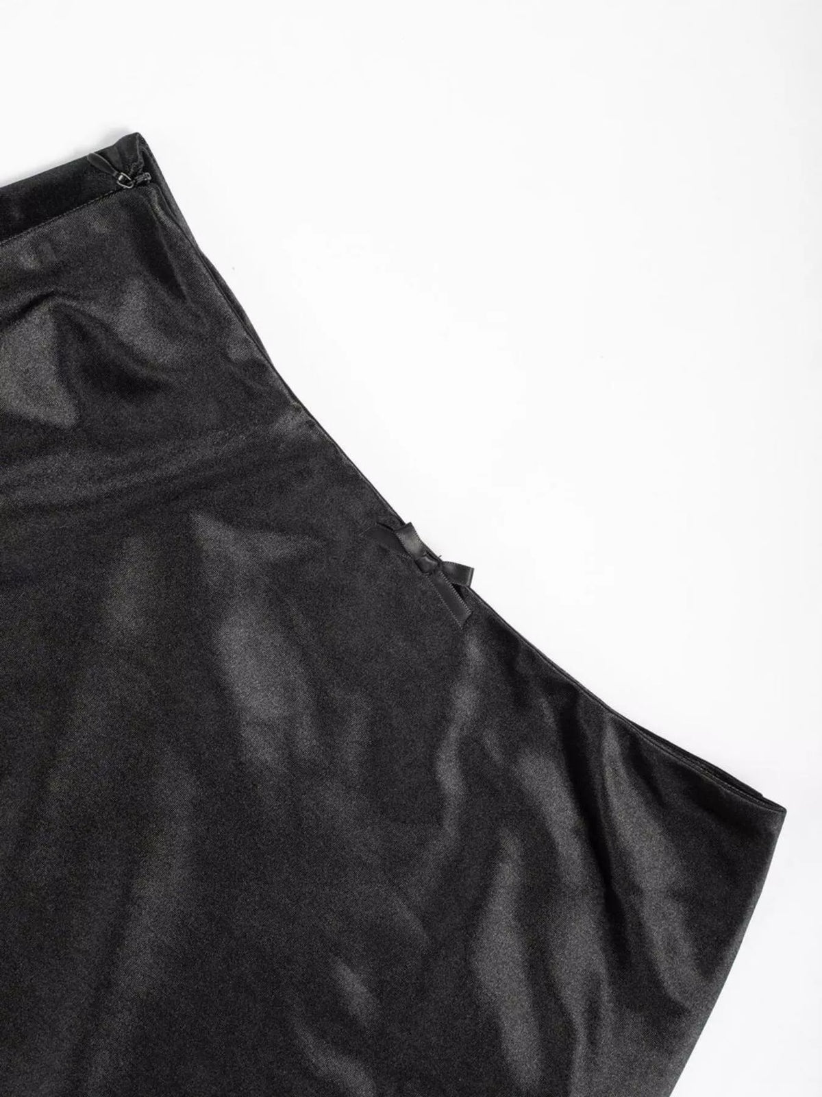 black satin midi skirt styled on model