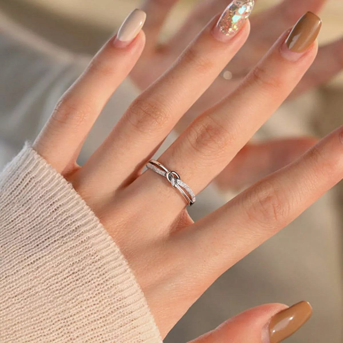 Sterling silver zircon knot ring back view