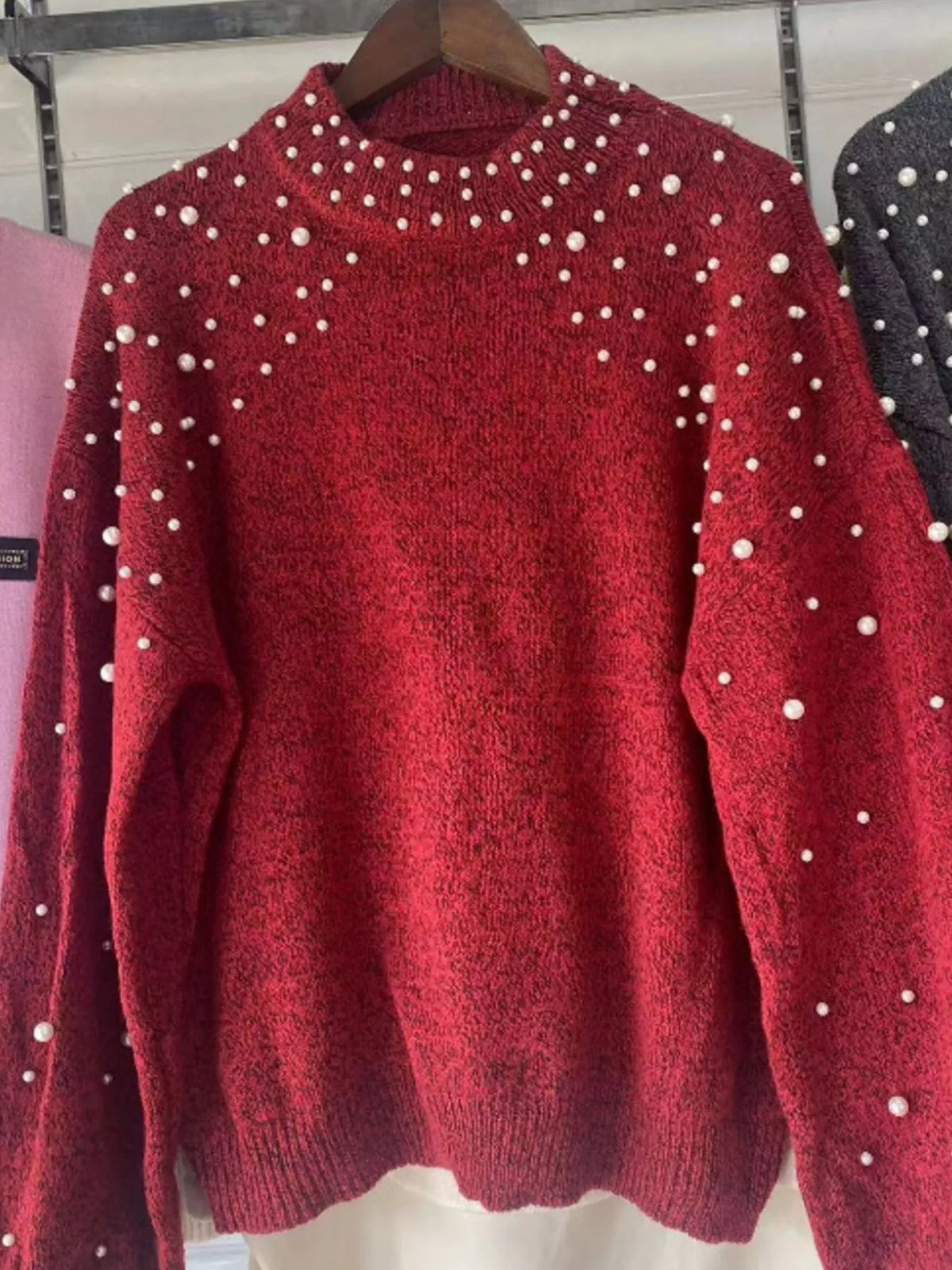 Pearl embellished mock neck sweater front view