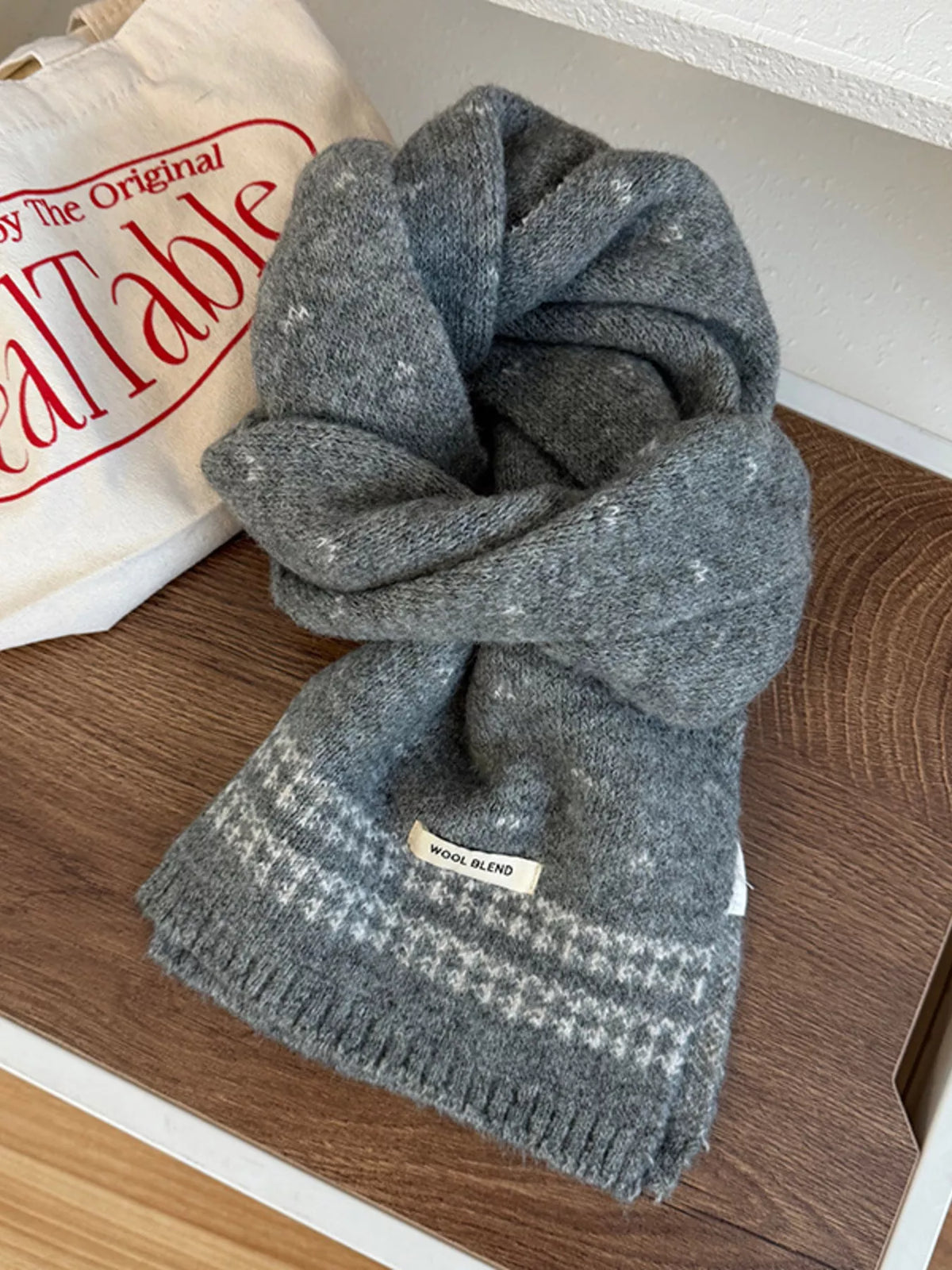 Warm knitted scarf looped for cold weather styling