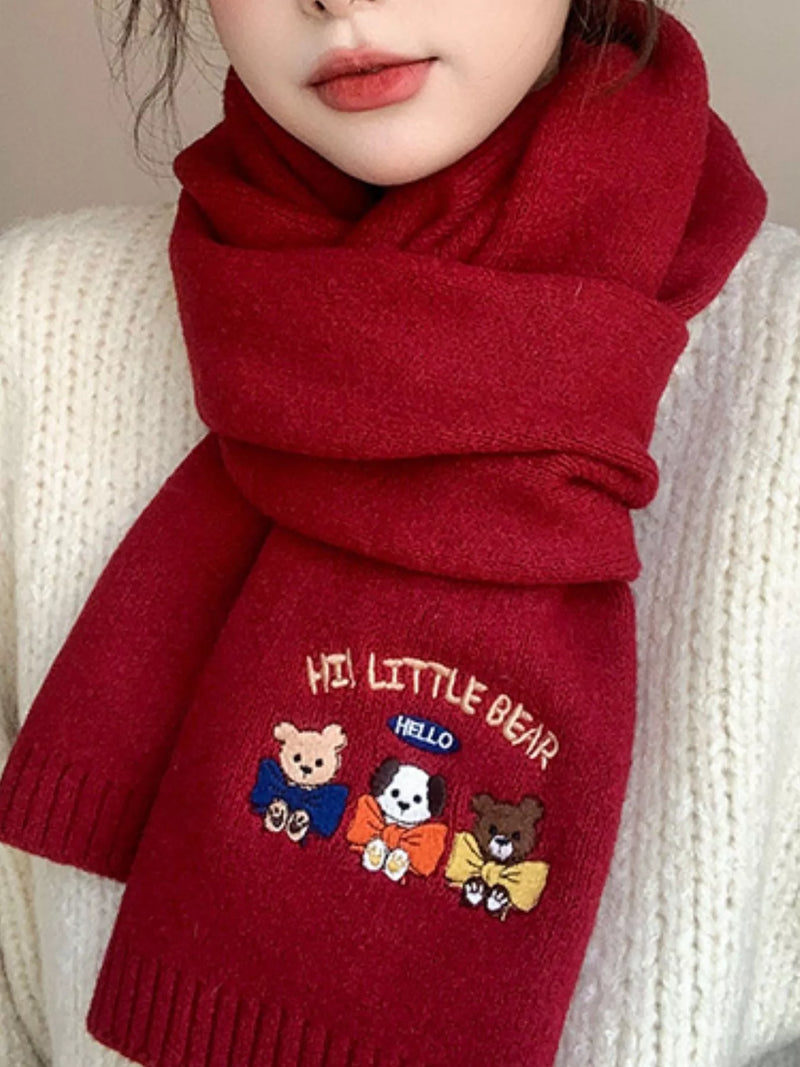 Embroidered cartoon warm scarf shown around the neck