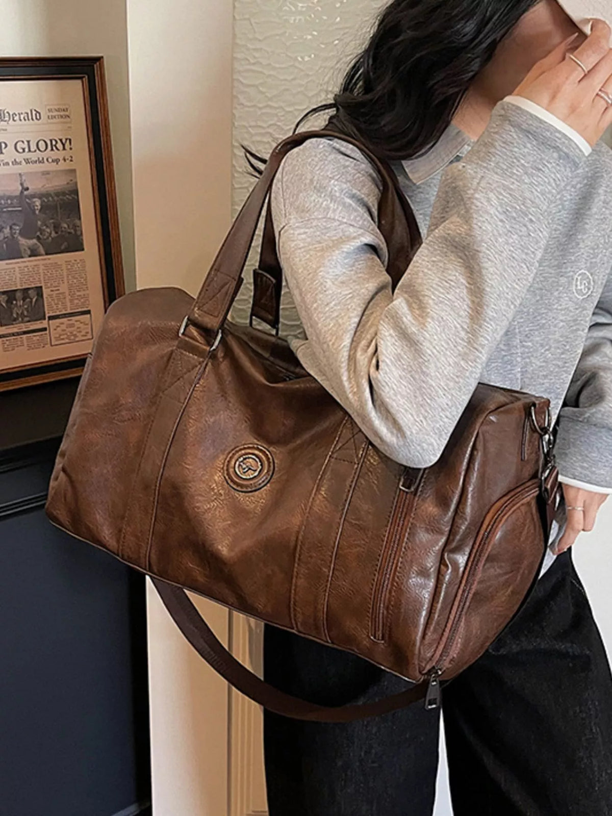 PU leather duffel bag handle detail