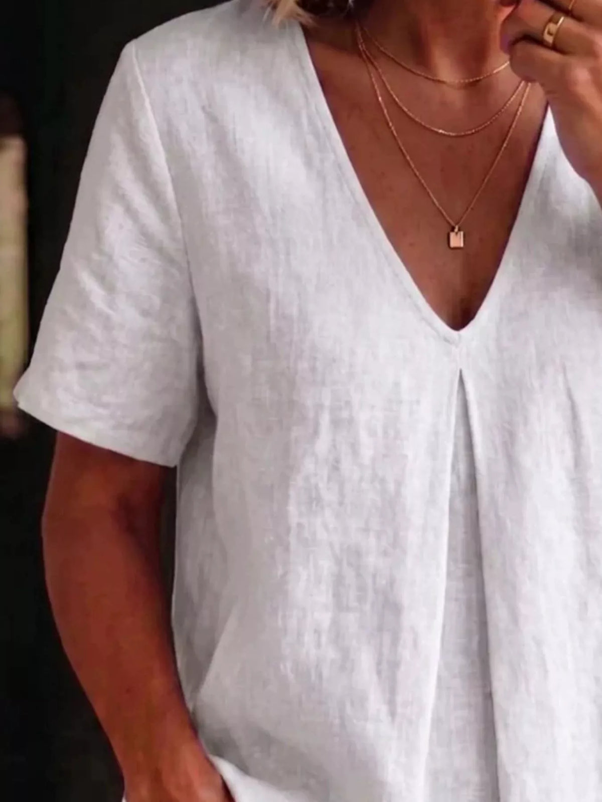 Pleated V neck blouse in black