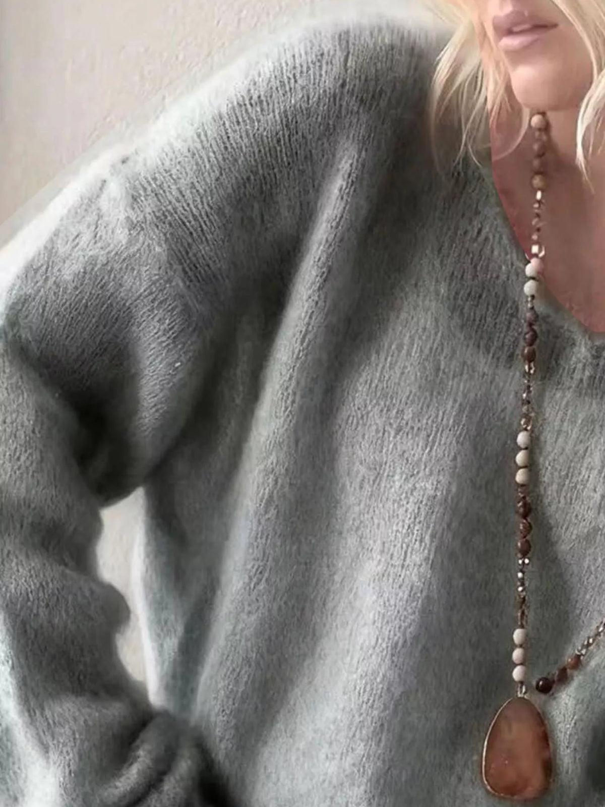 v neck dropped shoulder sweater on model