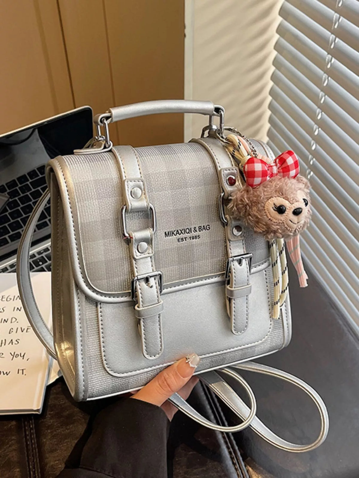 Plaid mini backpack with hanging charm