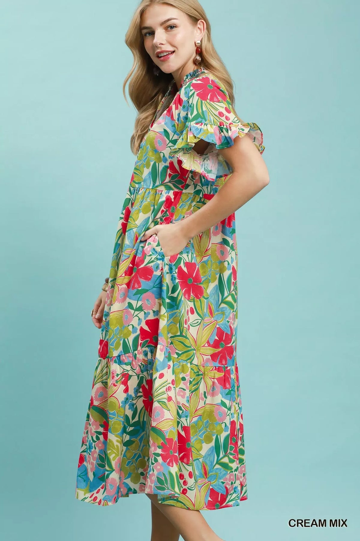 Cream tropical floral tiered midi dress with ruffle sleeves front view