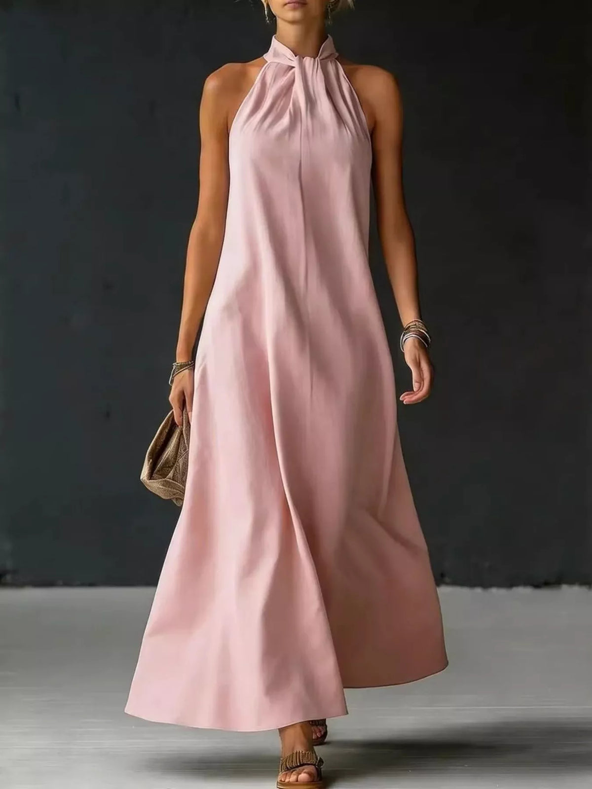 Halter maxi dress in a light color, full length