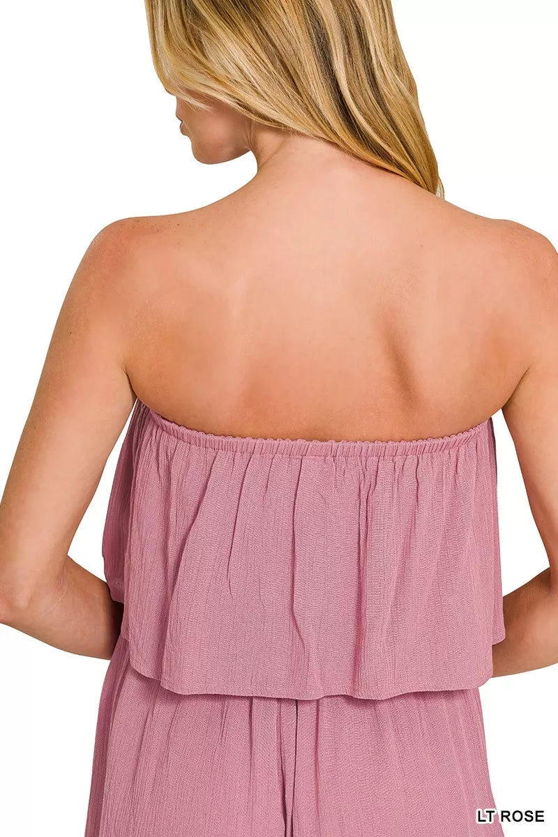 Side view of the strapless romper showing the relaxed fit