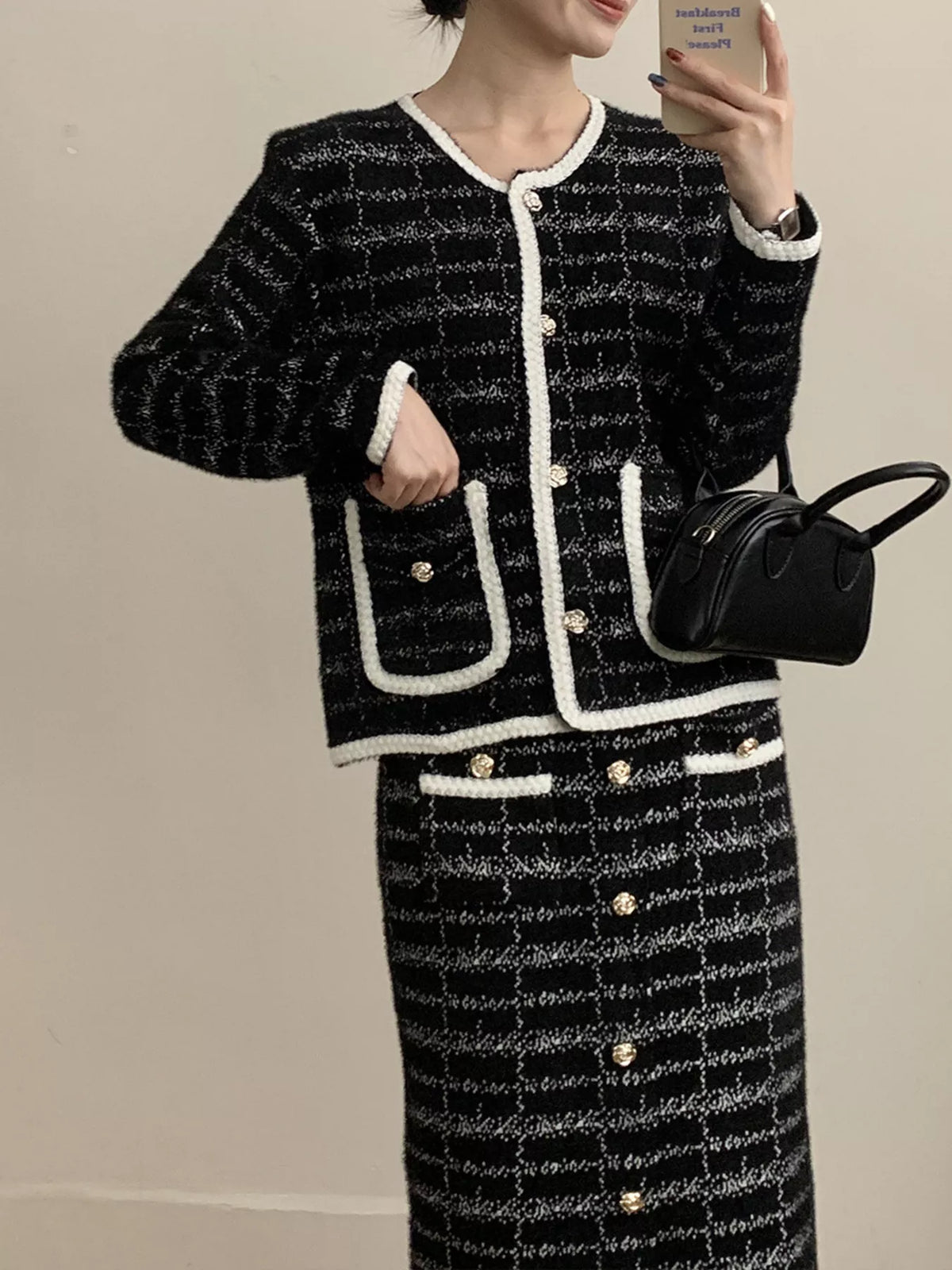 Tweed contrast trim jacket and skirt two piece set front view