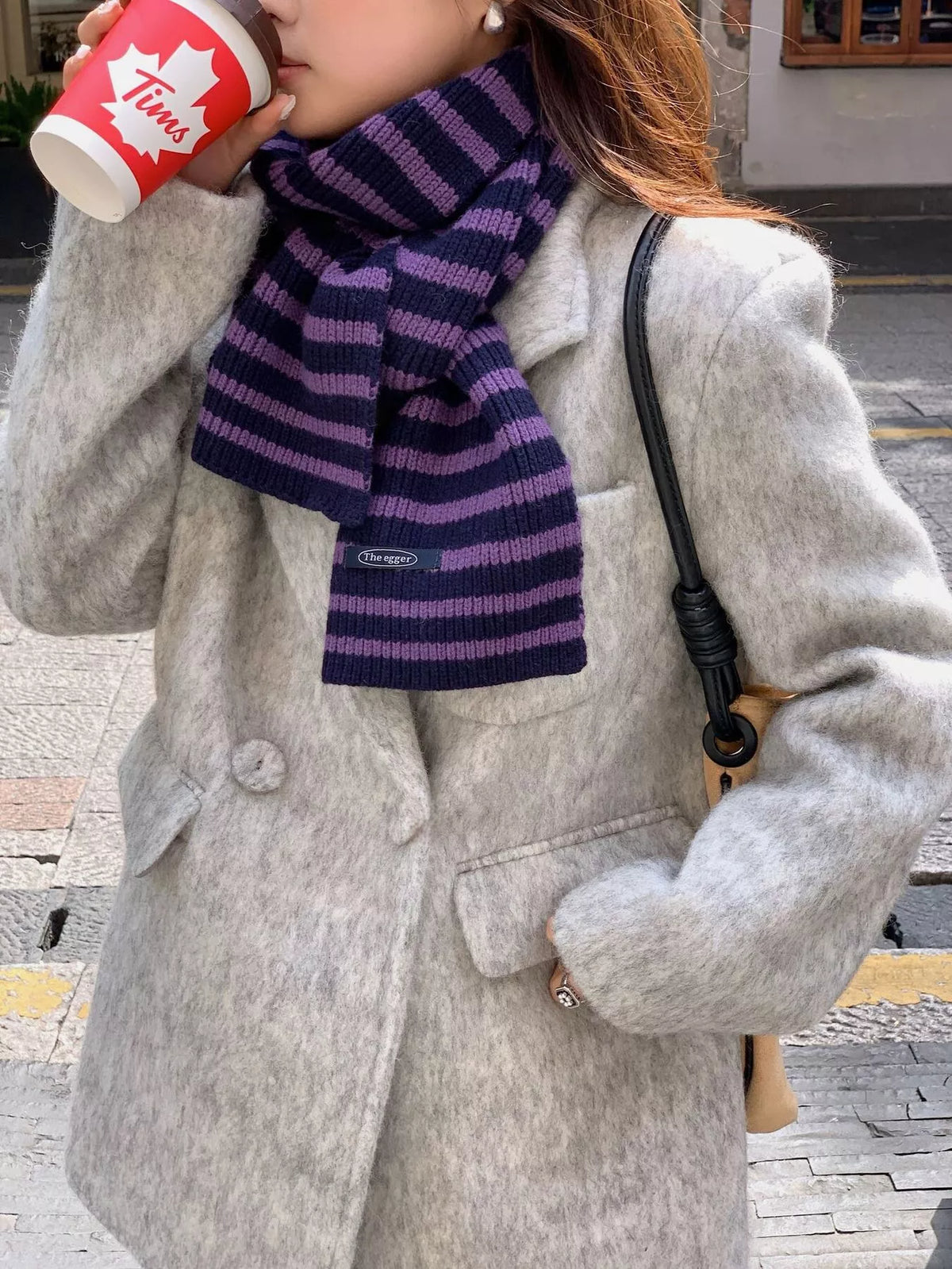 Wool striped knitted winter scarf draped view