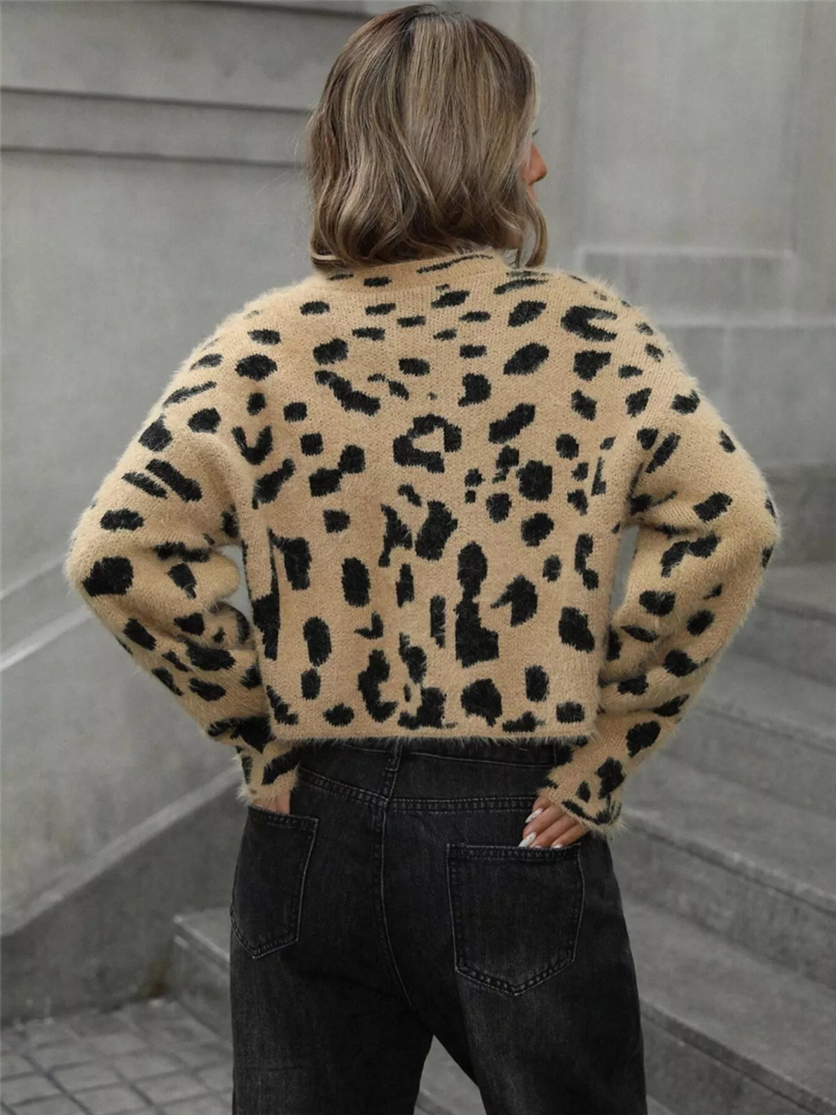 Fuzzy leopard sweater side view