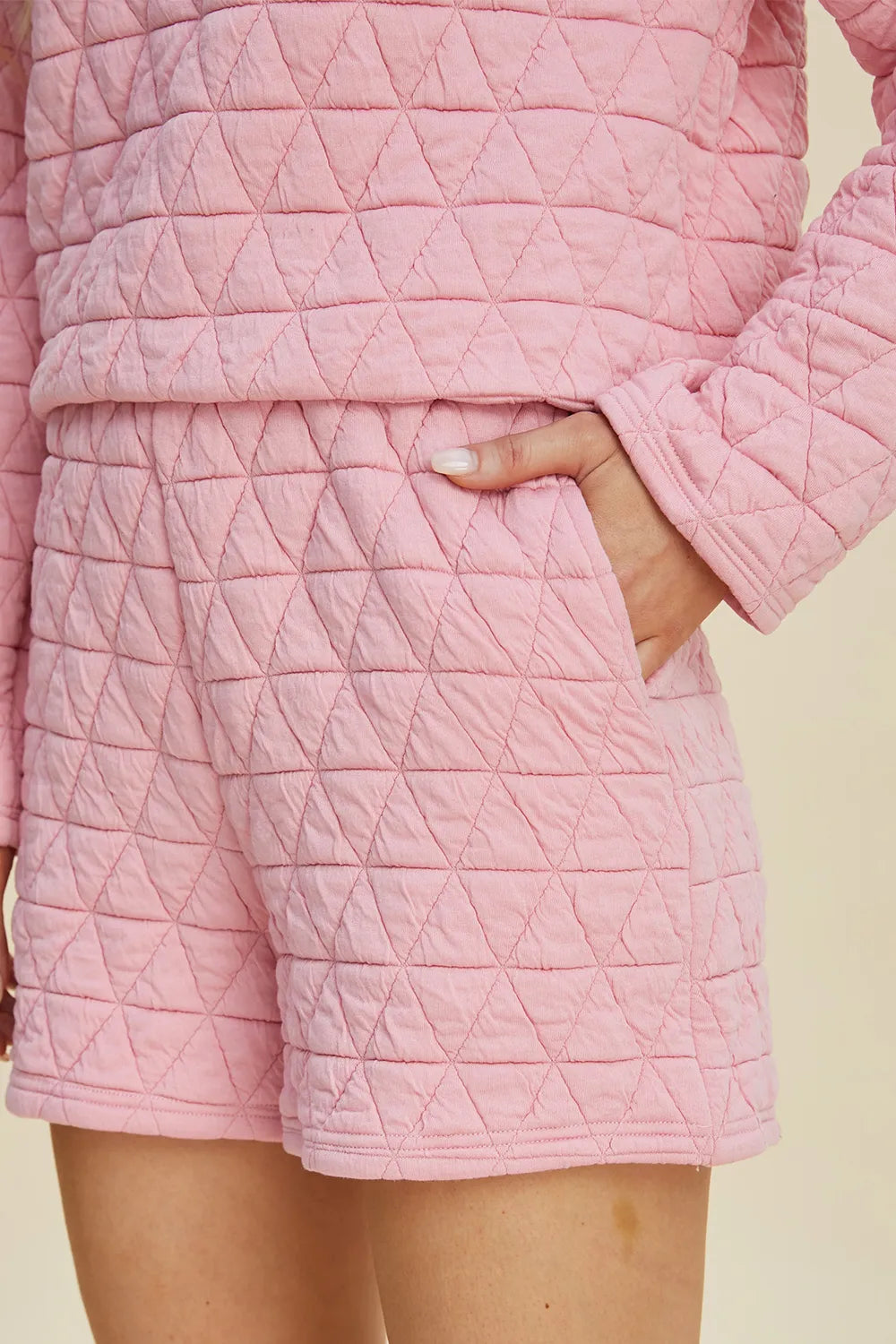 Shorts detail from the matching two piece set