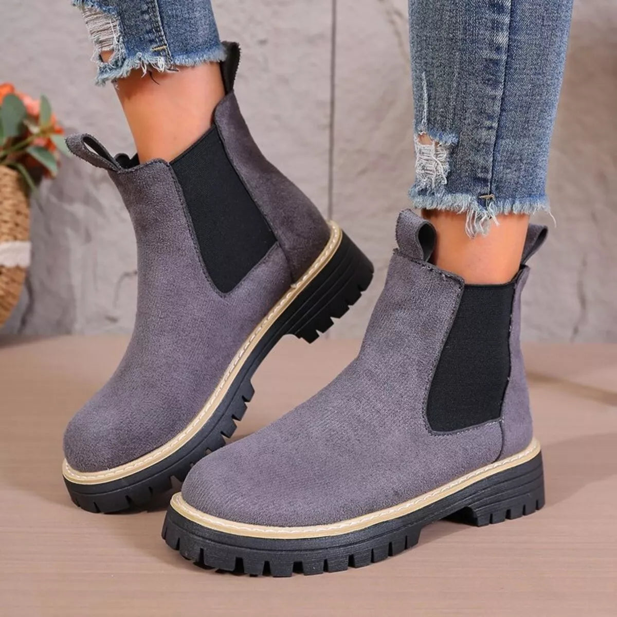 black round toe platform boots zip and trim detail
