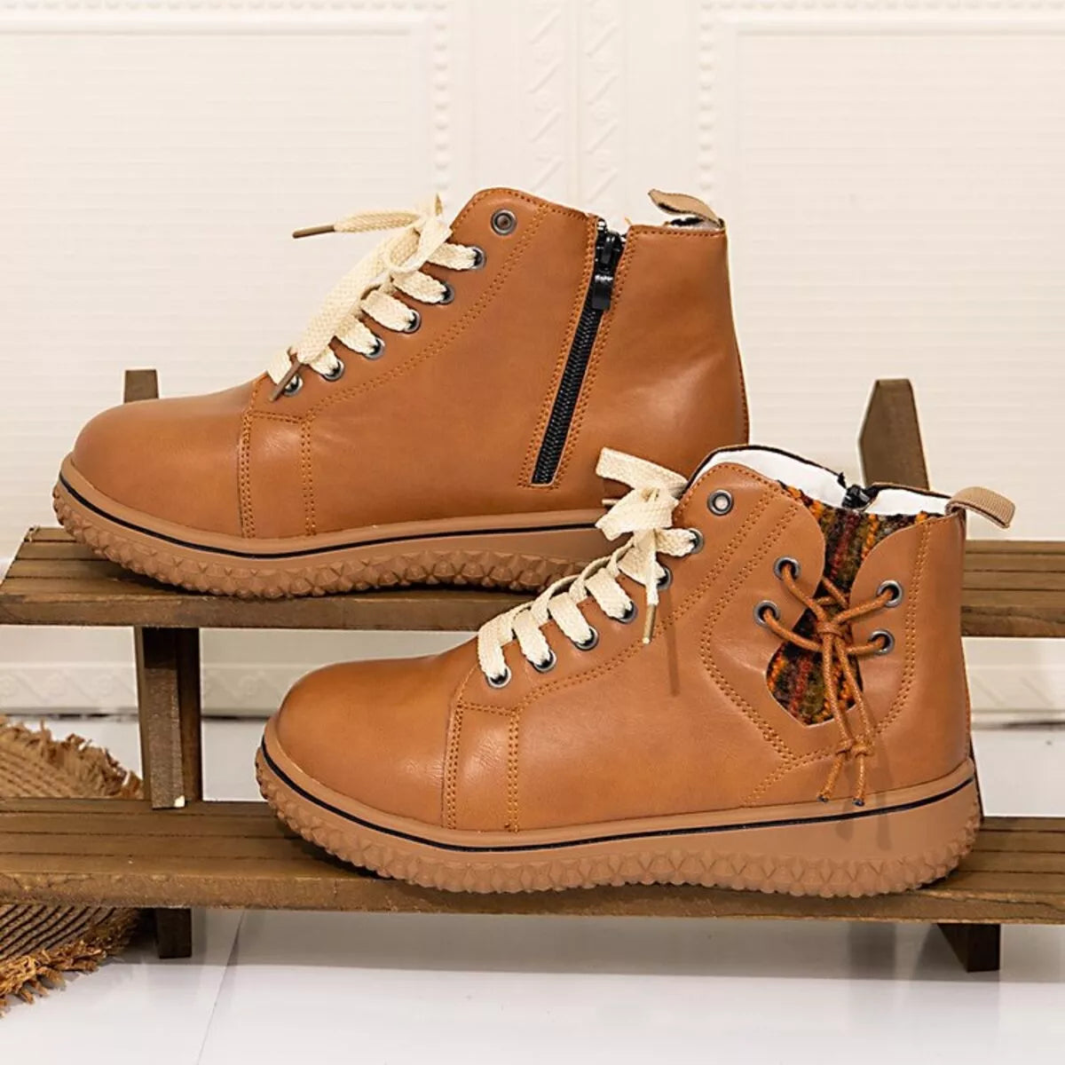 Round toe platform ankle boots paired with denim