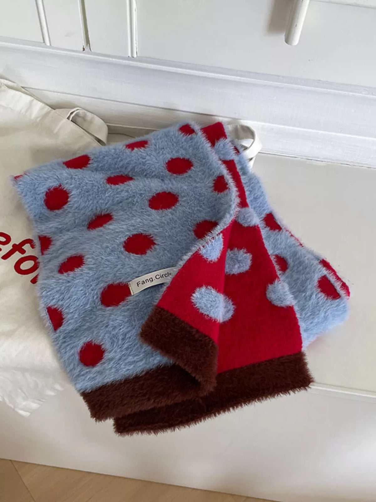 Playful fuzzy polka dot winter scarf