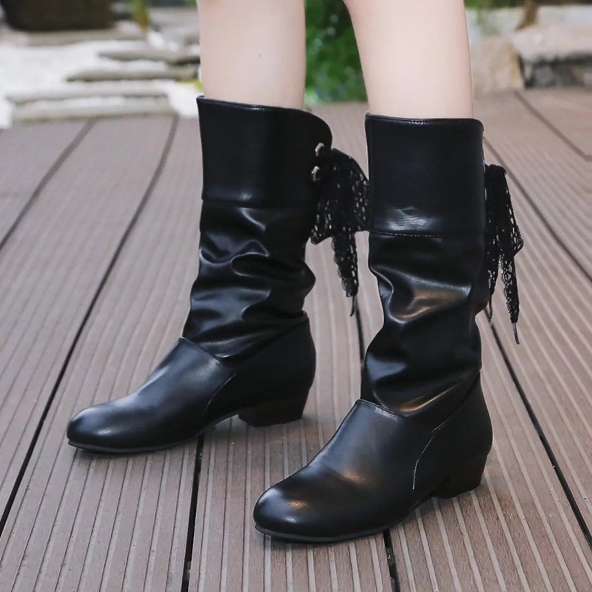 Round toe block heel boots styled on model