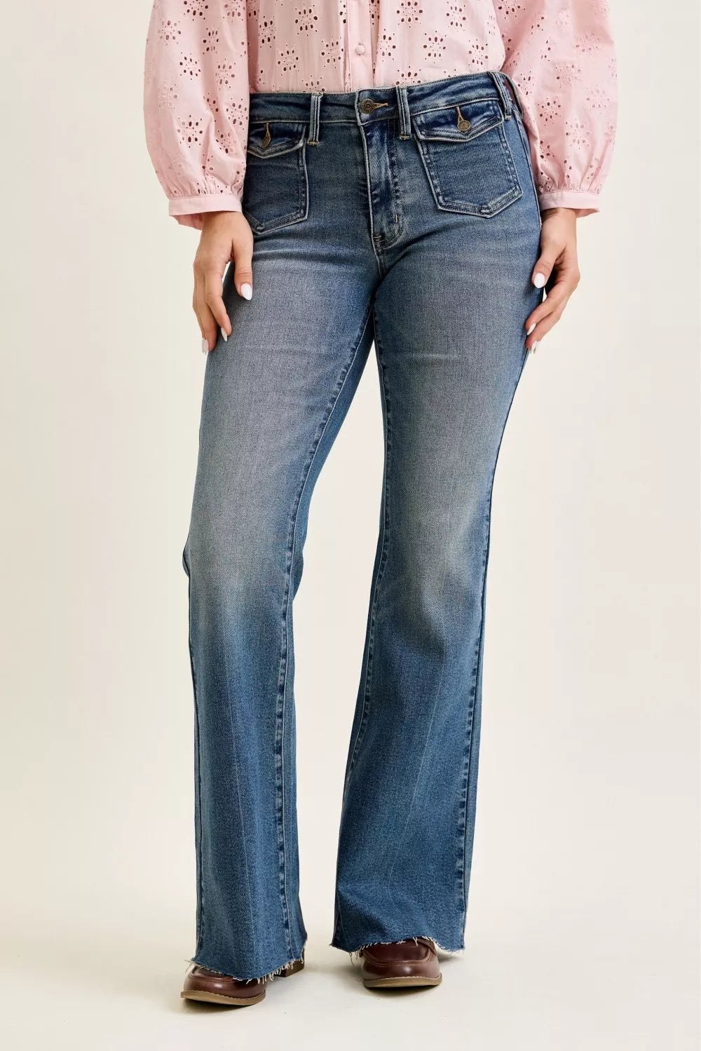 Judy Blue medium wash flap pocket flare jeans front