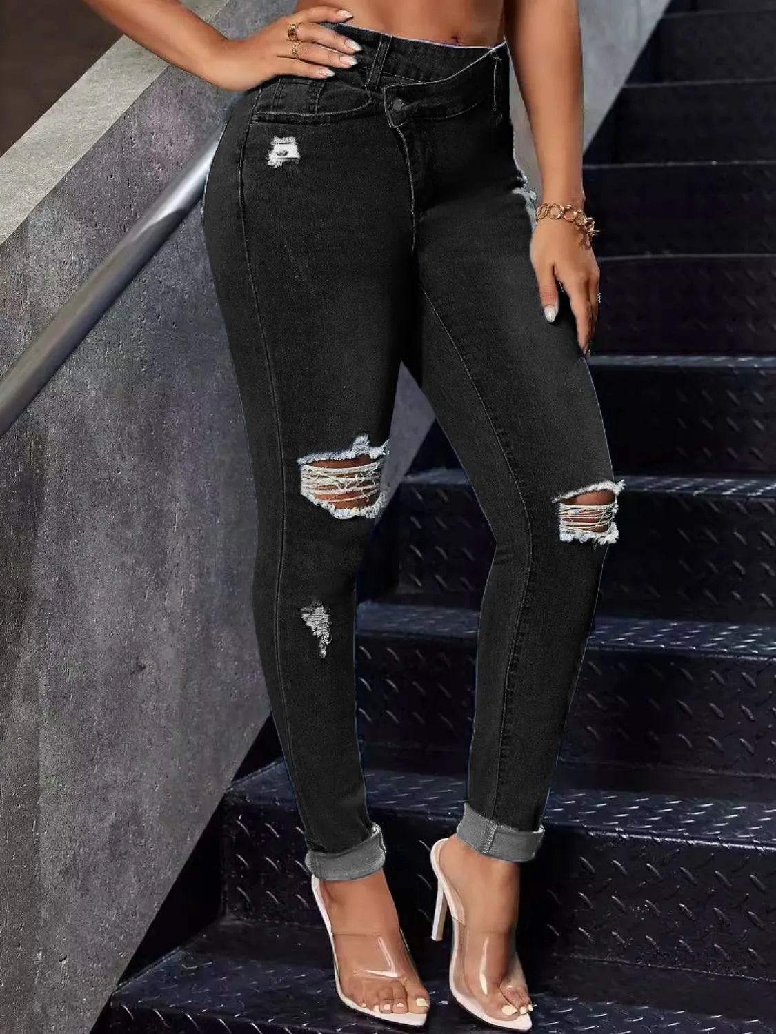 Model wearing distressed skinny jeans