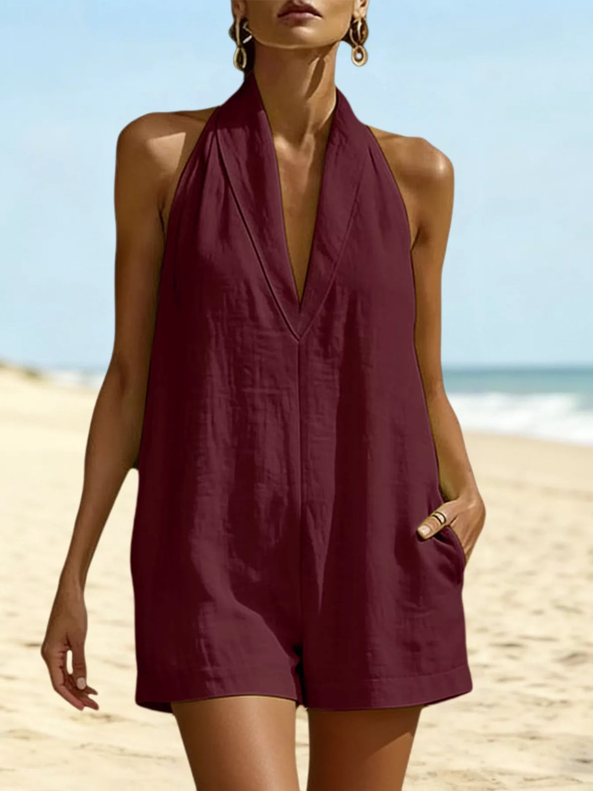 Halter neck romper with pockets styled view
