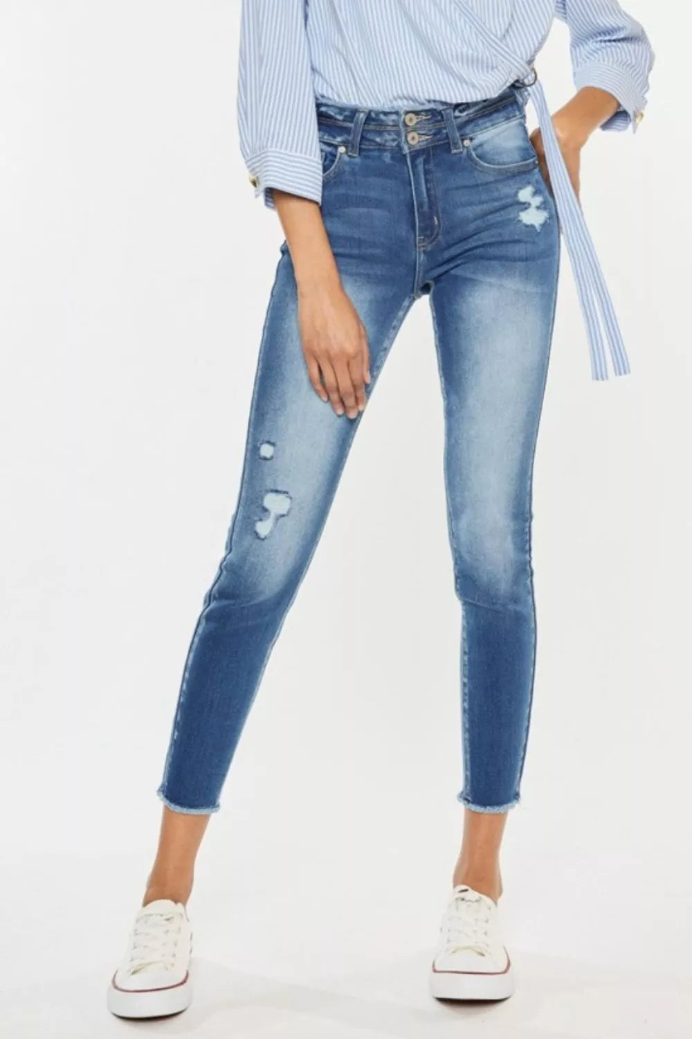 Distressed raw hem high waist skinny jeans front view