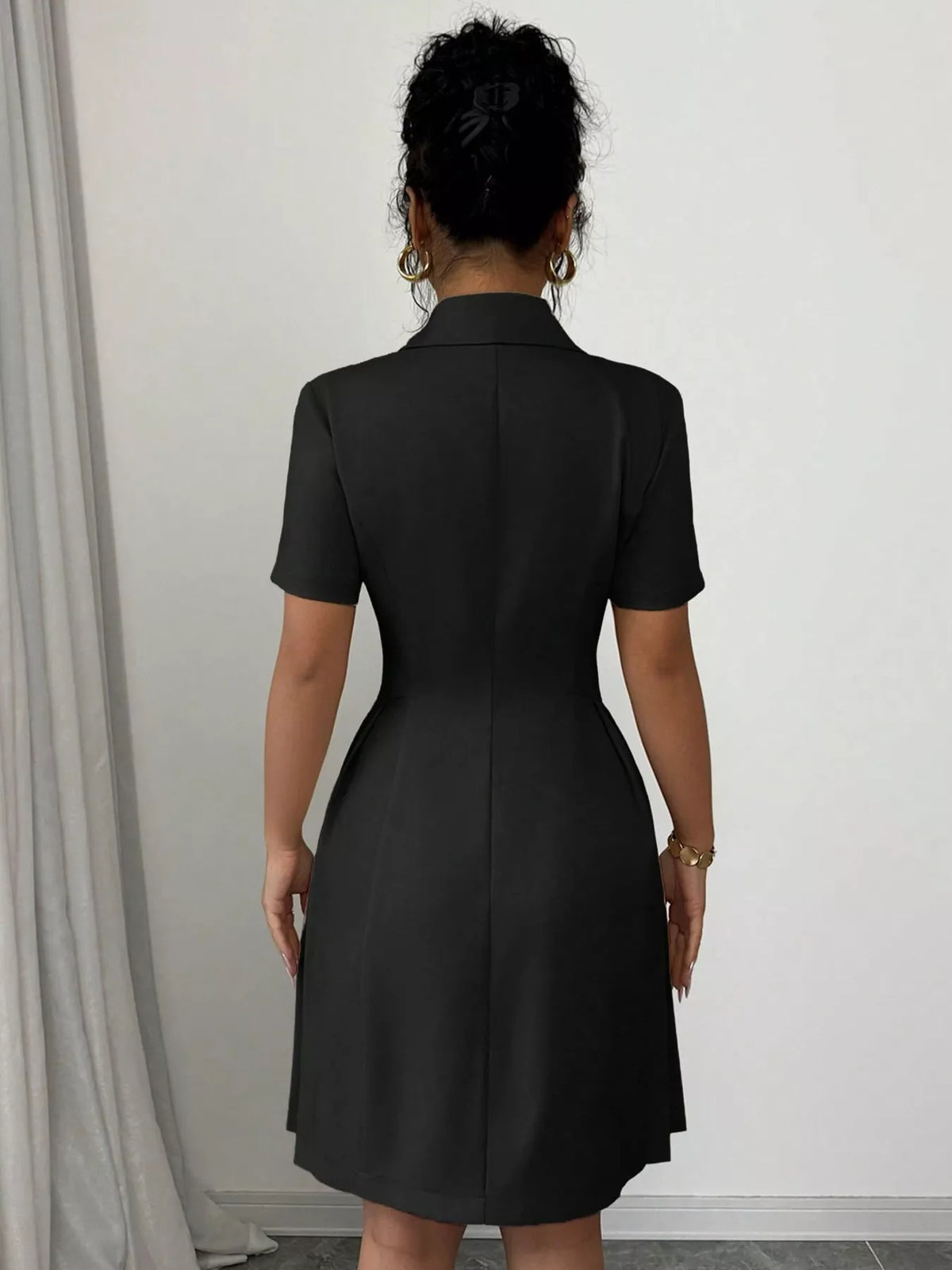 Double breasted pleated blazer dress back view