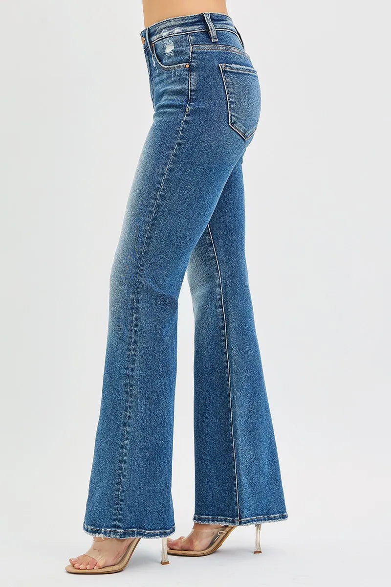 Close up of high rise tummy control waistband on flare jeans
