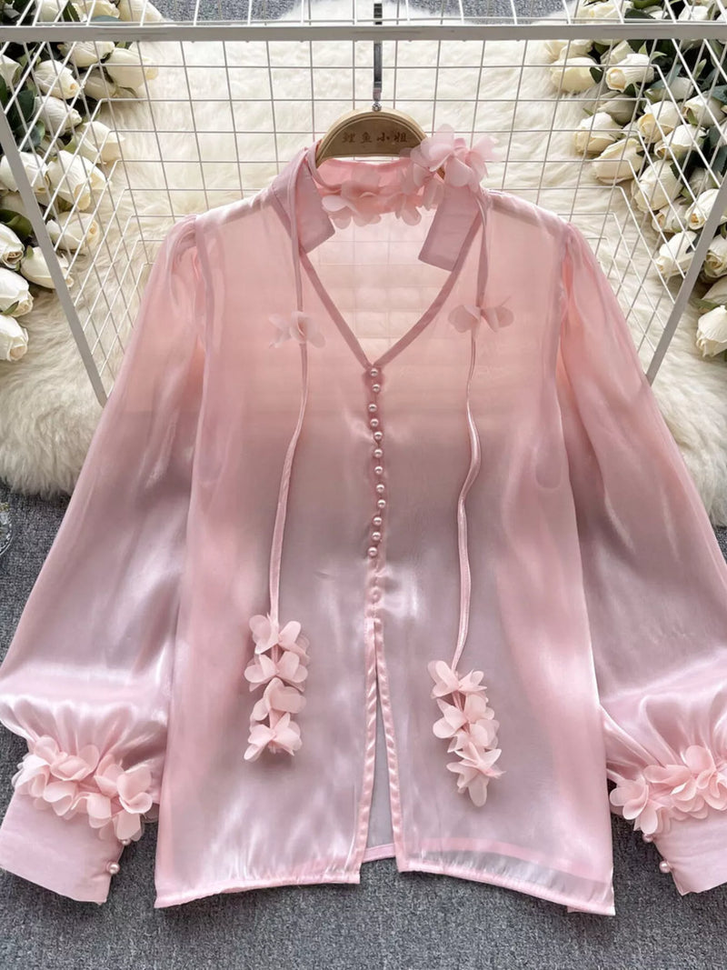 Sheer floral embellished shirt with button front, front view
