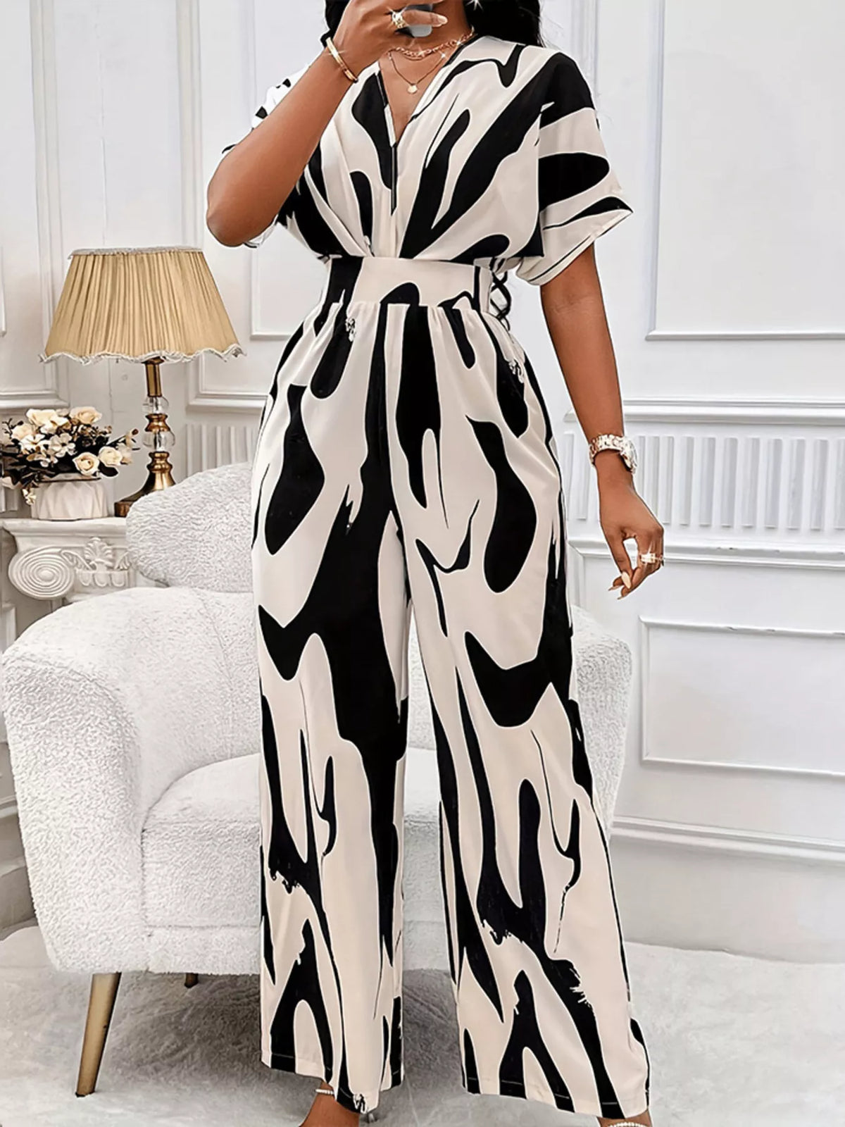 Abstract print wide leg jumpsuit with ruched bodice side view
