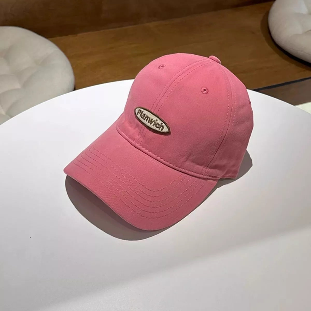 Black embroidered cap shown from the back
