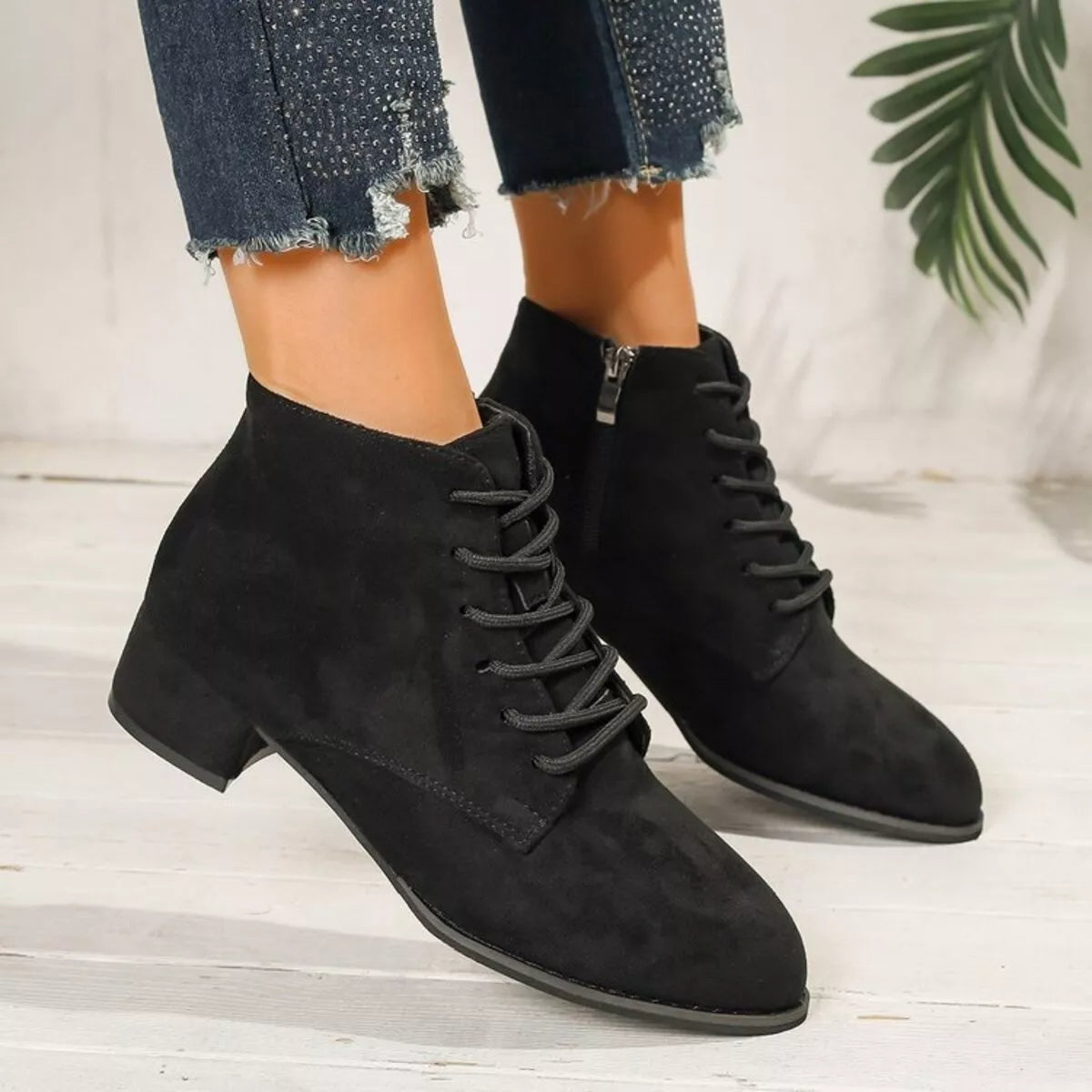 black lace up block heel boots side profile