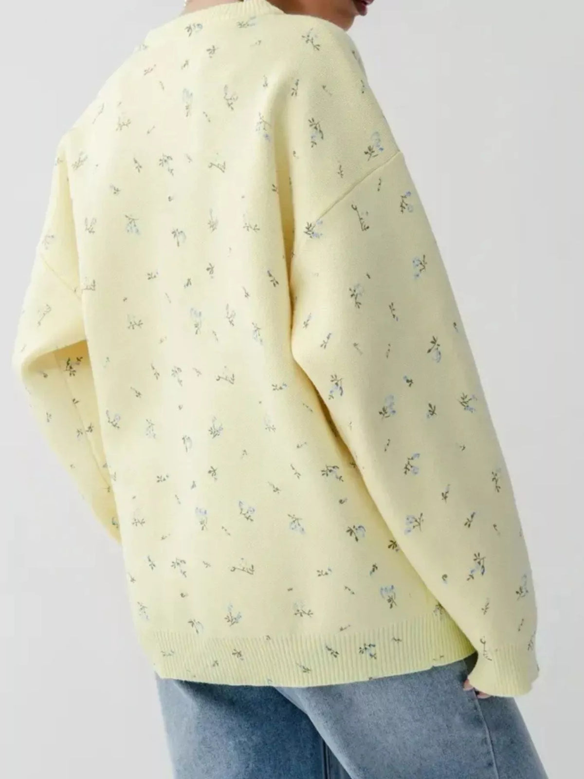 ribbed hem floral long sleeve sweater fabric detail close up