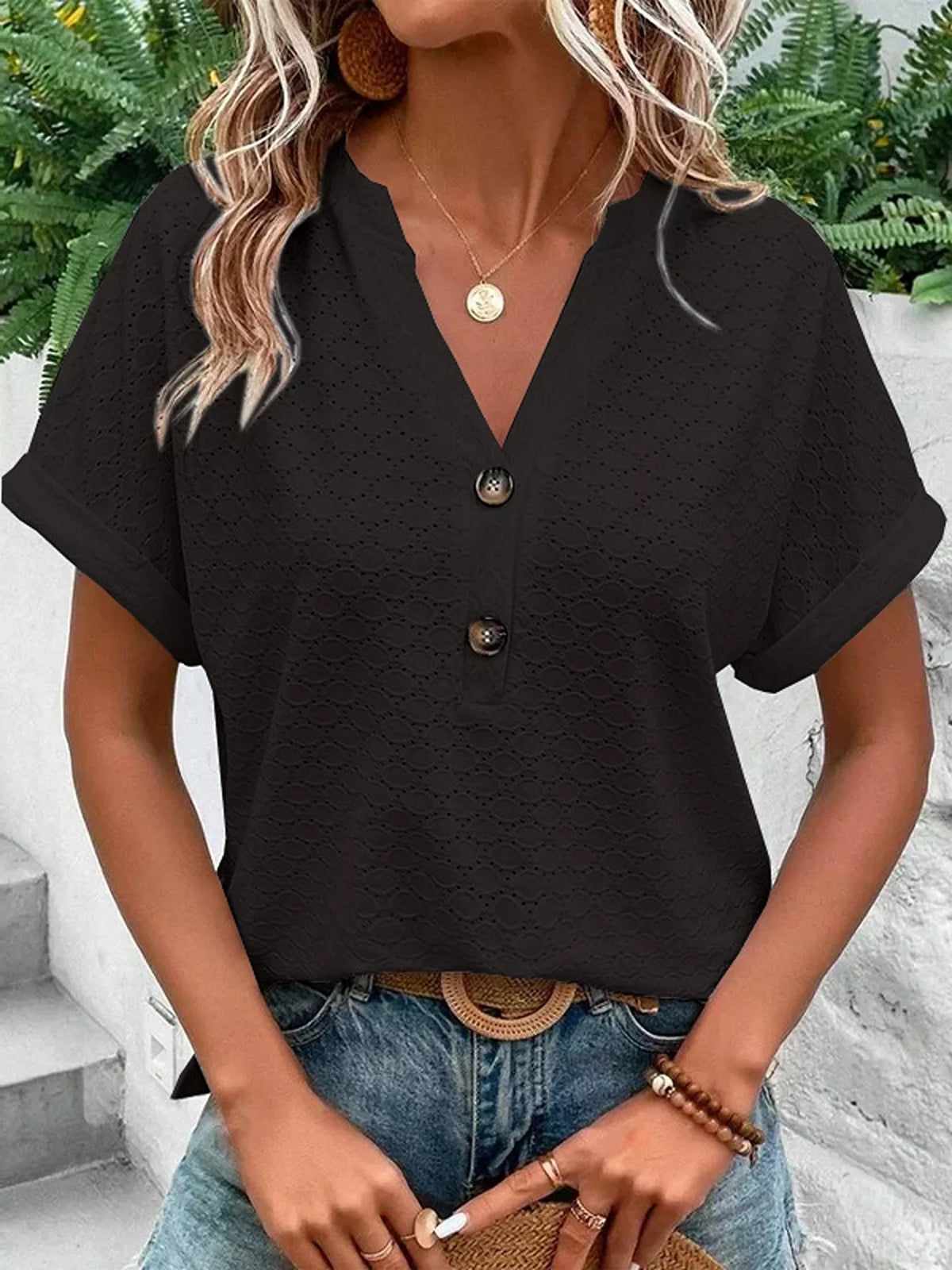 Womens short sleeve top shown in a black colourway