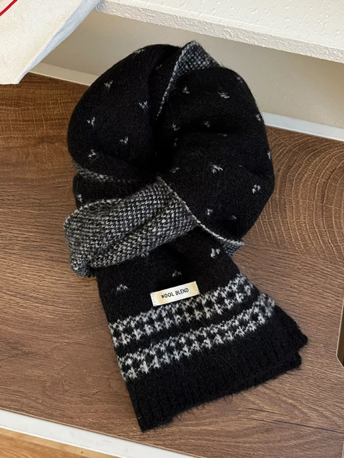 Close view of the soft knitted texture of the winter scarf