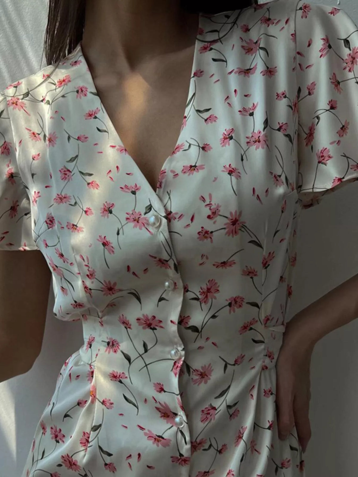 Close up of the floral print in dusty pink